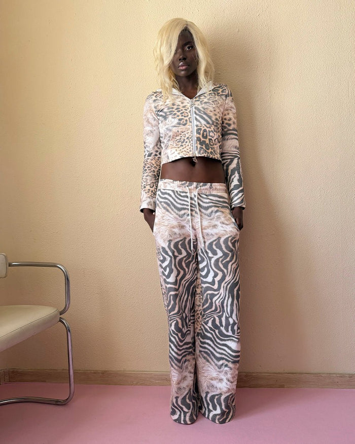BLING SWEATPANTS LEOPARD - leopard print sweatpants, front view on female model - Cold Culture