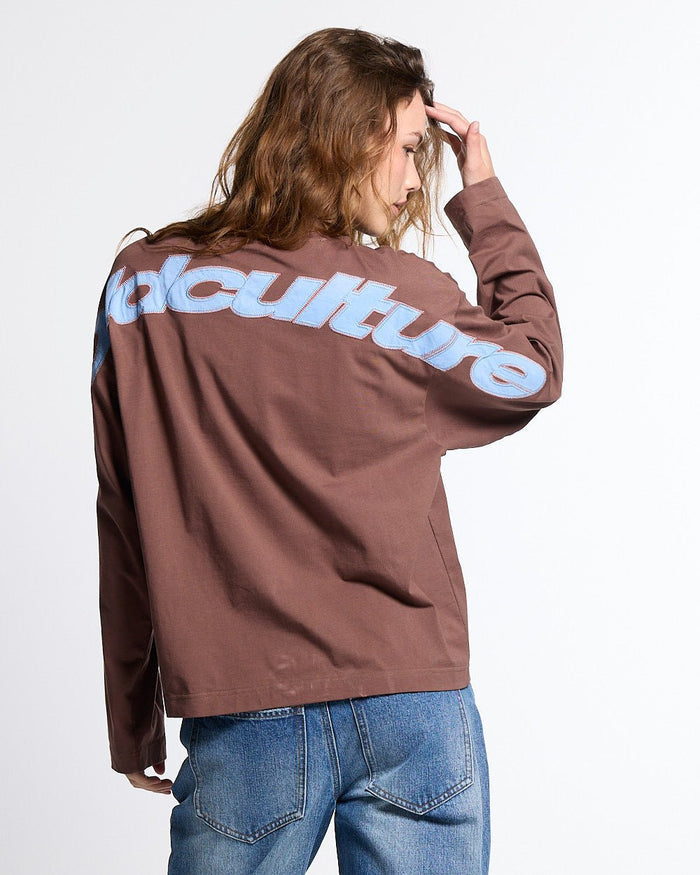 CURVED KNOTS LONGSLEEVE BROWN - brown logo print longsleeve tee, back view on female model - Cold Culture #woman