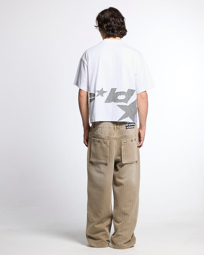 DISTRESS DEFENSE TEE WHITE - white graphic print tee, back view on male model - Cold Culture