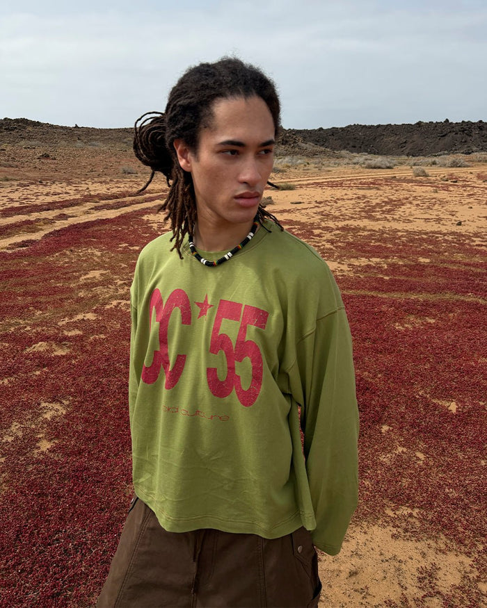 FLYING FREE LONGSLEEVE GREEN - green graphic print longsleeve tee, street style shot - Cold Culture