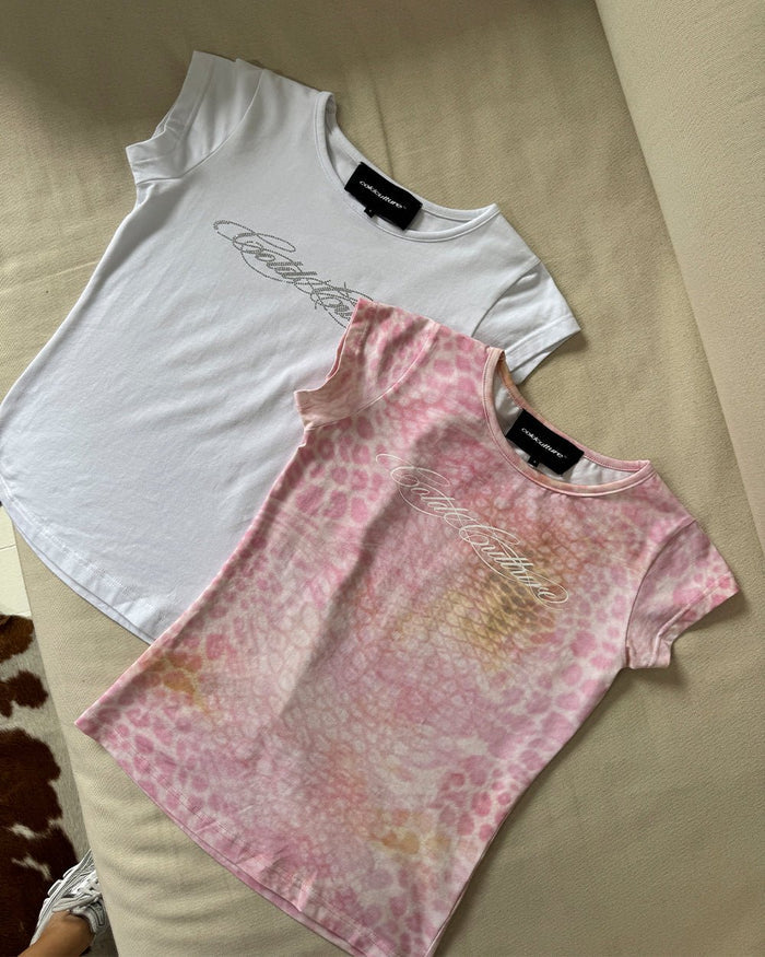 JAGUAR BABY TEE PINK - pink animal print baby tee, flat lay with matching pieces - Cold Culture