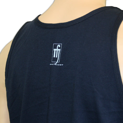 Close-up of the back of a navy blue sleeveless Mantralogy shirt, worn by a person facing away. A small white Mantralogy logo and stylized mt graphic appear below the neckline.