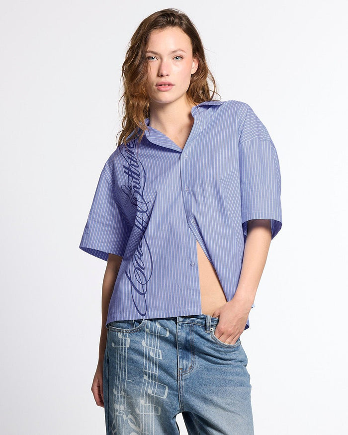 OFFICE SCRIPT SHIRT BLUE - blue striped short sleeve shirt, front view on female model - Cold Culture #woman
