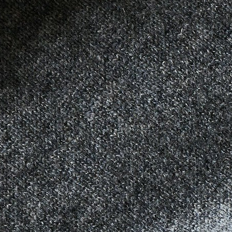 Close-up of dark gray fabric with a textured surface. | Exclude | Swatch