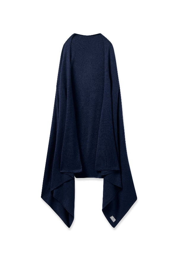 Woman wearing petite plume poncho | Grid | Exclude