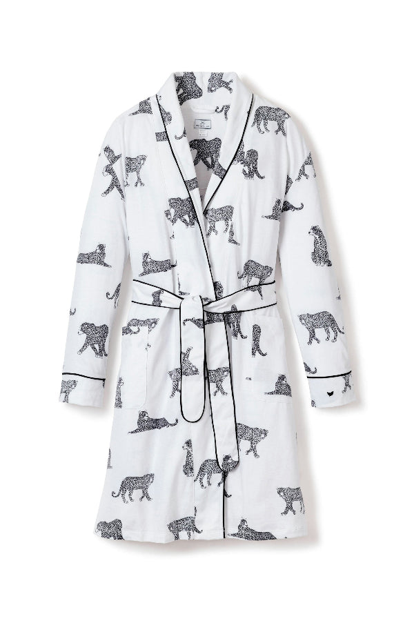 White robe with black animal print on a white background | Still | Exclude