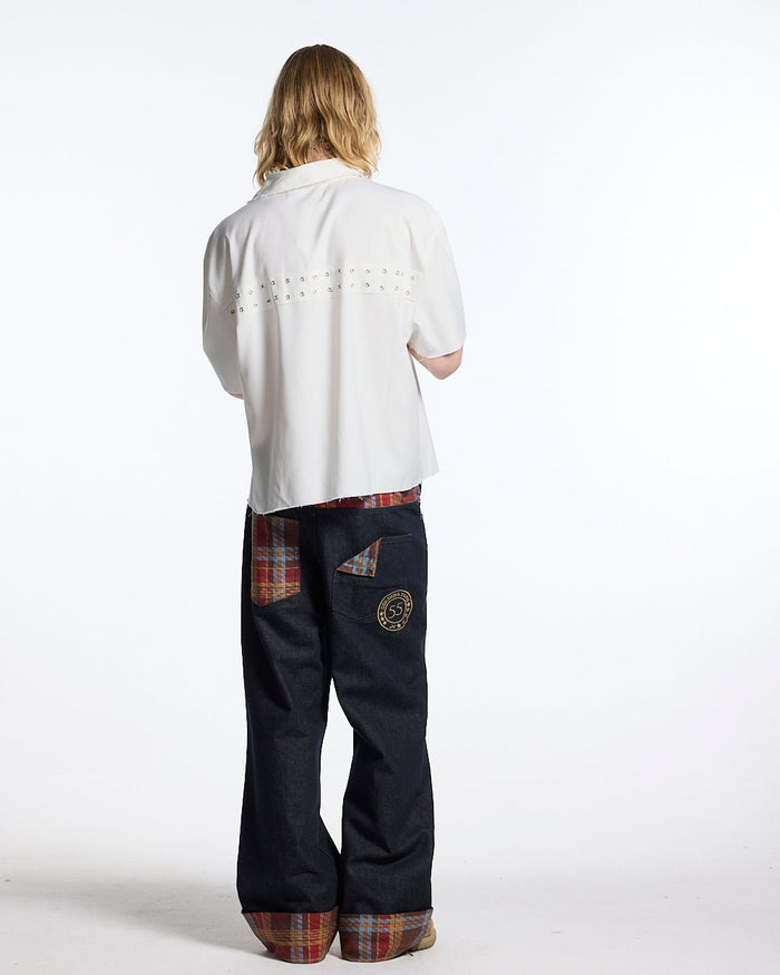 RAINY TARTAN V3 PANTS - navy denim pants with tartan cuffs, back view on male model - Cold Culture #man