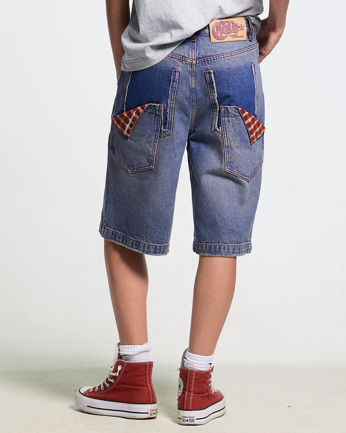 REVIVAL V2 SHORTS MEDIUM DENIM - blue washed denim shorts, back view on female model - Cold Culture