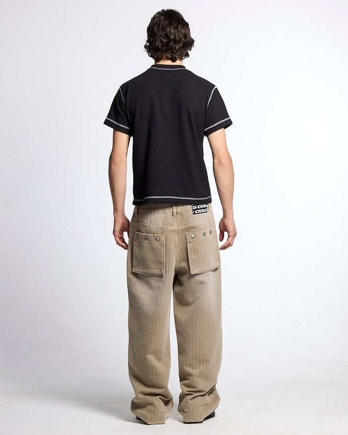 UNDERSKIN TEE BLACK - black contrast stitch tee, back view on male model - Cold Culture
