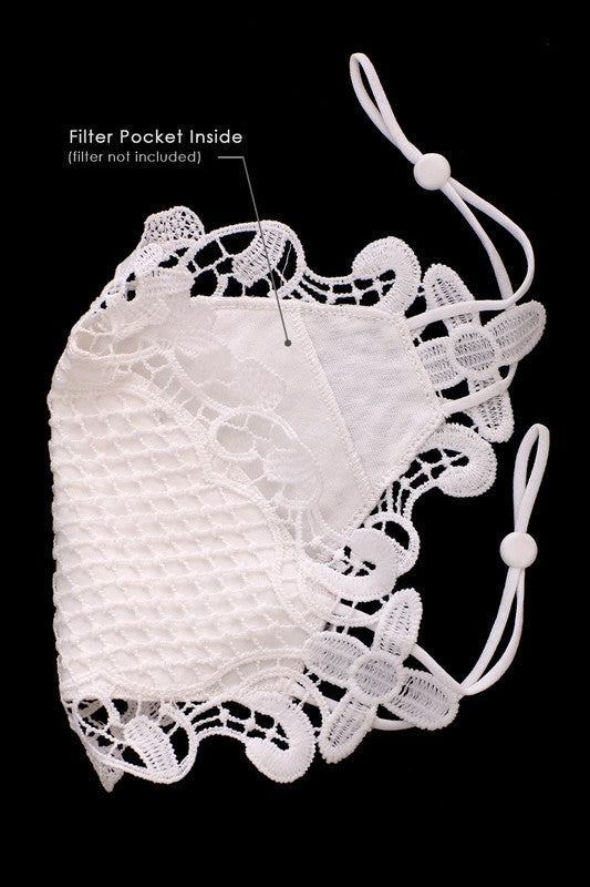Lacy white face mask.
