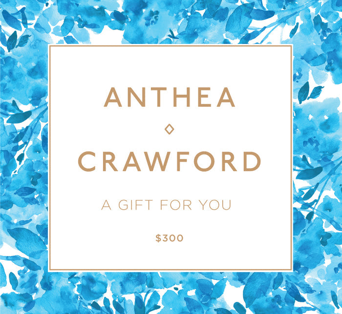 Gift certificate for Anthea Crawford with blue floral design. $300 Online Gift Card