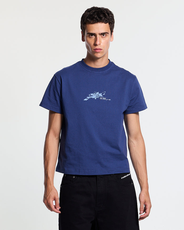 BLOOM TEE NAVY - navy floral print tee, front view on male model - Cold Culture