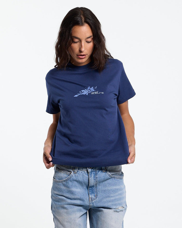 BLOOM TEE NAVY - navy floral print tee, front view on female model - Cold Culture