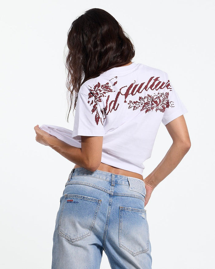 BLOOM TEE WHITE - white floral print tee, back view on female model - Cold Culture