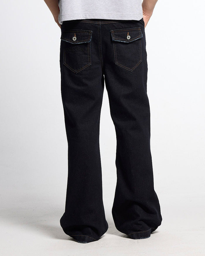 BLURRED V5 BOOTCUT PANTS RAW DENIM - raw denim bootcut pants, back view on male model - Cold Culture