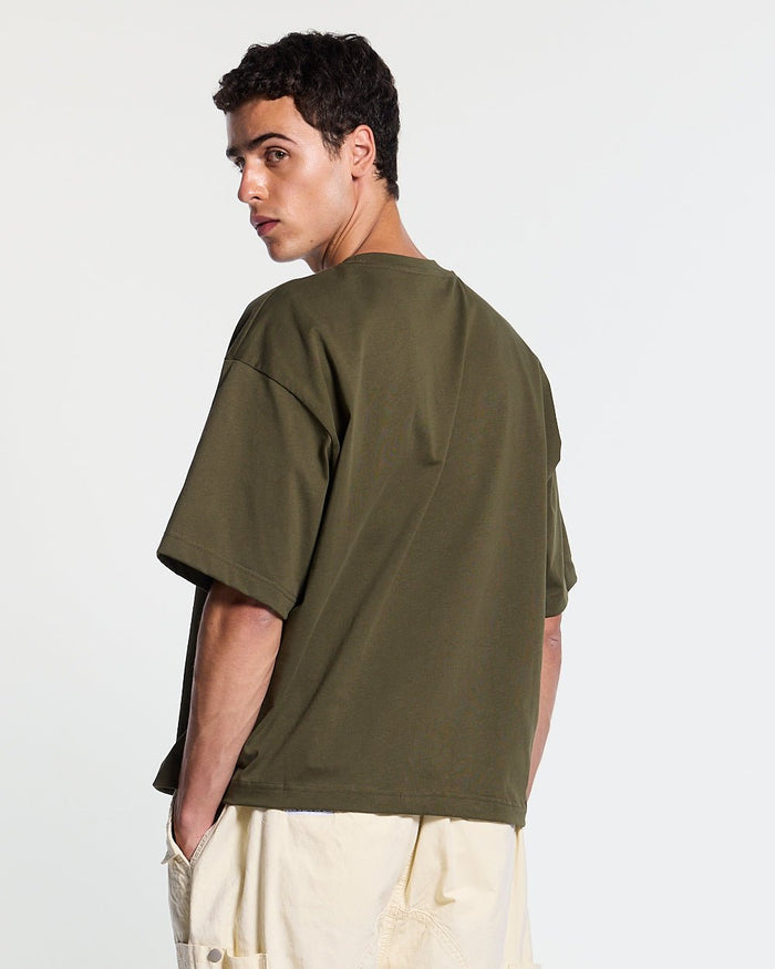 COLLECTIVE TEE GREEN - green graphic print tee, back view on male model - Cold Culture