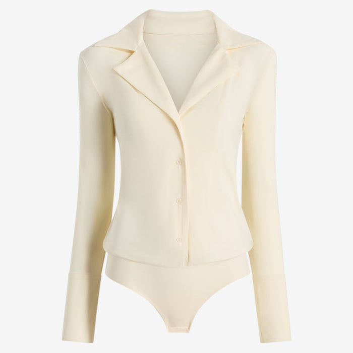 Cream-colored body suit on a white background | Still
