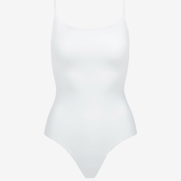 White bodysuit on a light gray background | Exclude