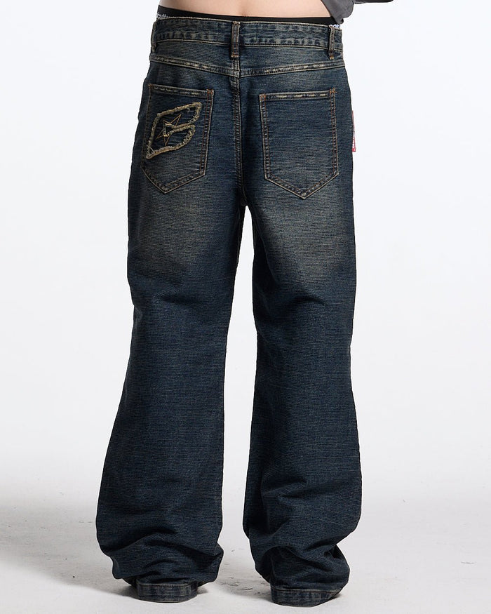 CONCRETE BOOTCUT JEANS BLUE - washed blue bootcut jeans, back view on male model - Cold Culture #man