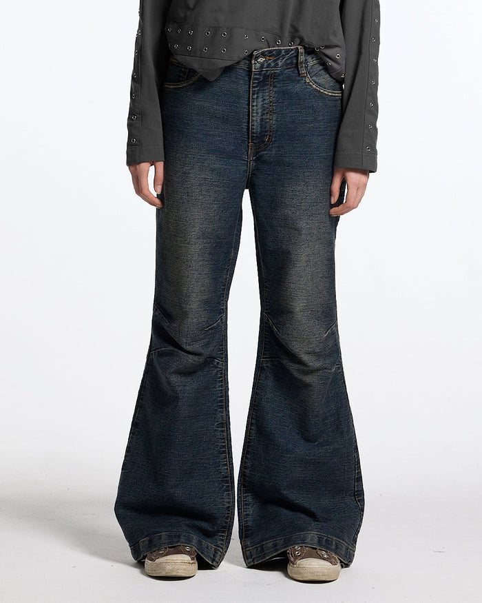 CONCRETE BOOTCUT JEANS BLUE - washed blue bootcut jeans, front view on female model - Cold Culture #woman