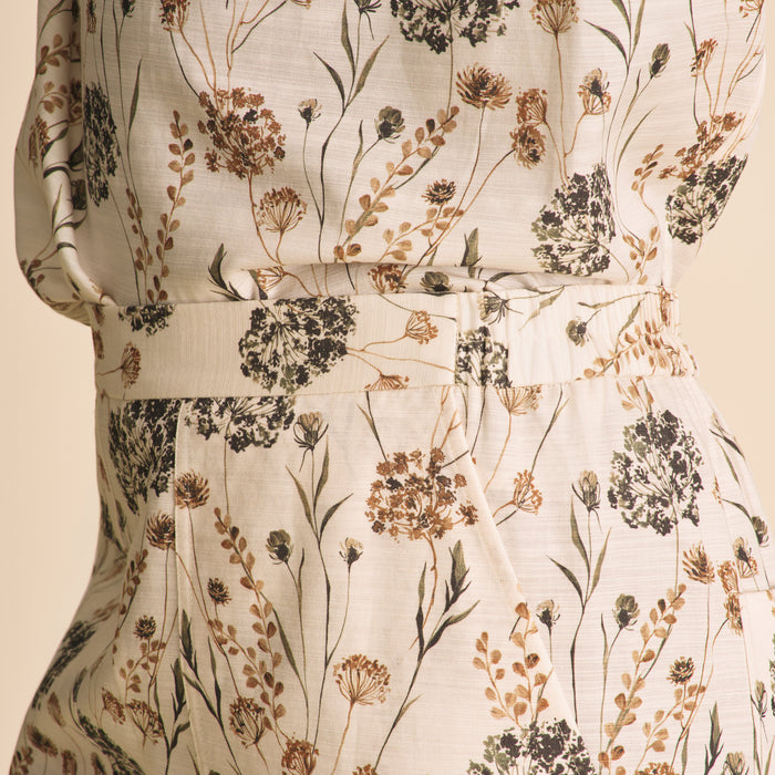 Floral patterned dress with a neutral background