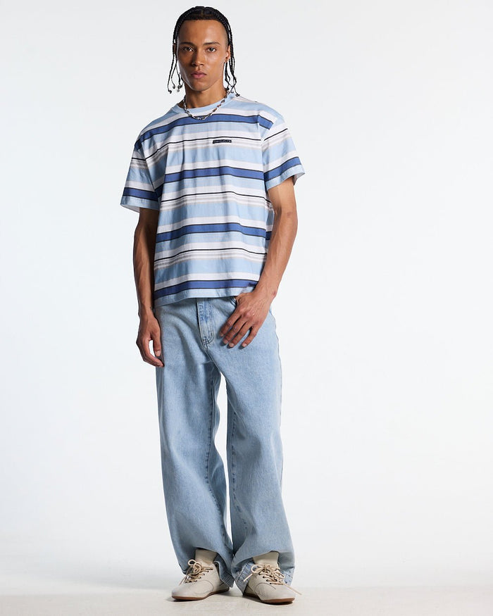 DRIFTLINE TEE BLUE - blue striped tee, front view on male model - Cold Culture