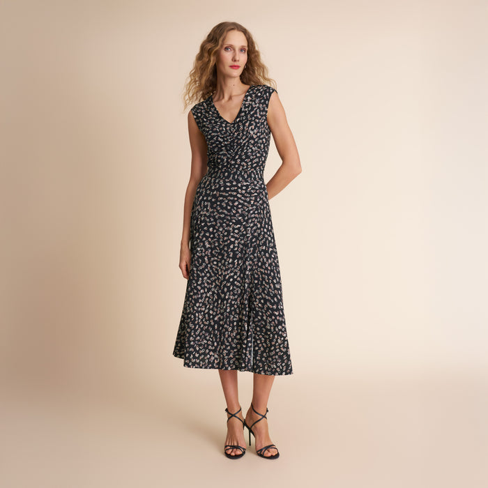 image of a woman wearing the franka top in spin dot