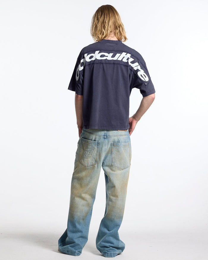 FULL ON WASHED TEE BLUE - washed navy blue tee, back view on male model - Cold Culture