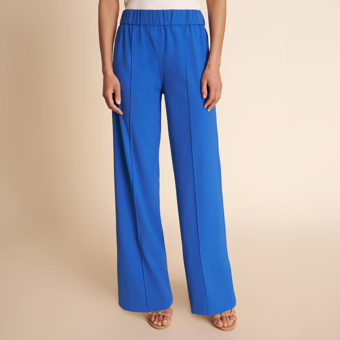 Blue pants on a beige background | Lead