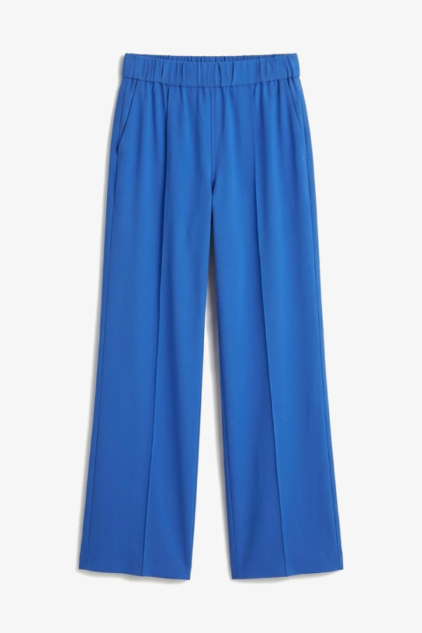 Blue pants on a white background.| Still | Exclude