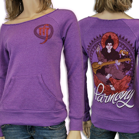 A mannequin wears a Mantralogy purple sweatshirt with a front pocket, featuring a small heart-shaped design near the left shoulder and an intricate illustration of two musicians, the word Harmony, and decorative patterns on the back.
