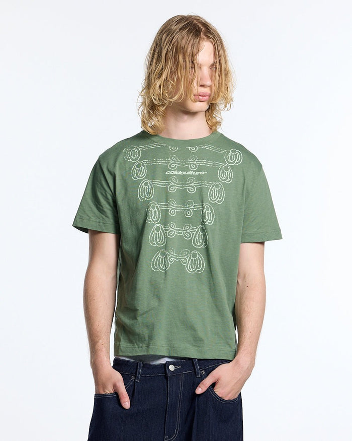 KNOTTING HILL TEE GREEN - sage green embroidered tee, front view on male model - Cold Culture #man