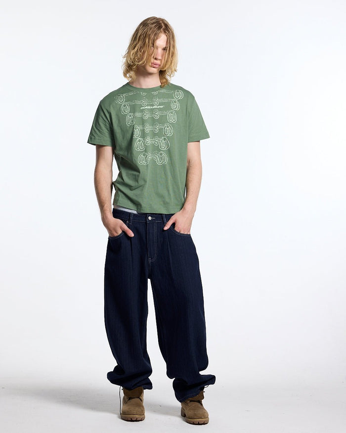 KNOTTING HILL TEE GREEN - sage green embroidered tee, front view on male model - Cold Culture #man