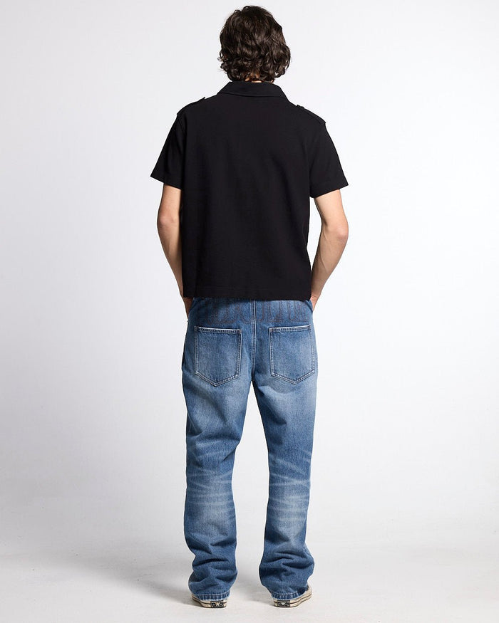 LOOPING POLO BLACK - black graphic print polo shirt, back view on male model - Cold Culture