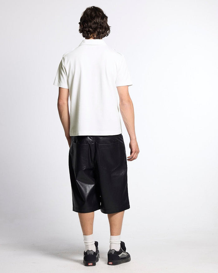 LOOPING POLO WHITE - white graphic print polo shirt, back view on male model - Cold Culture