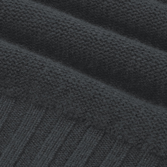 Close-up of a dark gray textured fabric
