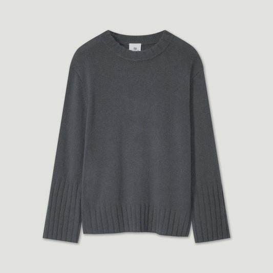 Dark gray sweater on a light gray background | Lead