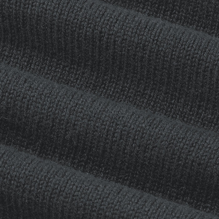 Close-up of dark gray fabric with a textured pattern
