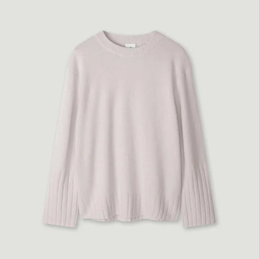 Light pink sweater on a light gray background | Lead