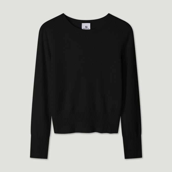 Black sweater on a light gray background | Lead