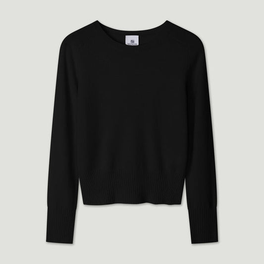 Black sweater on a light gray background | Lead