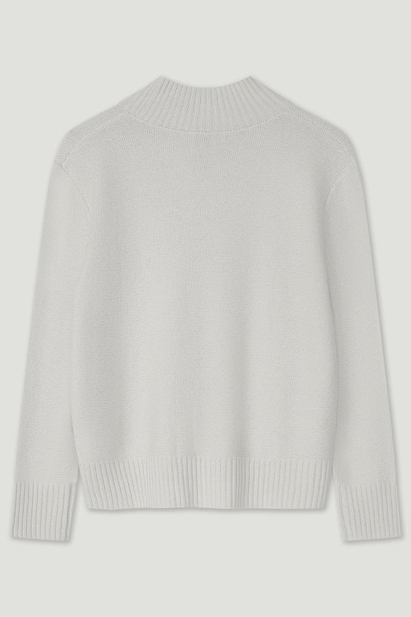 Light gray sweater on a light gray background | Exclude