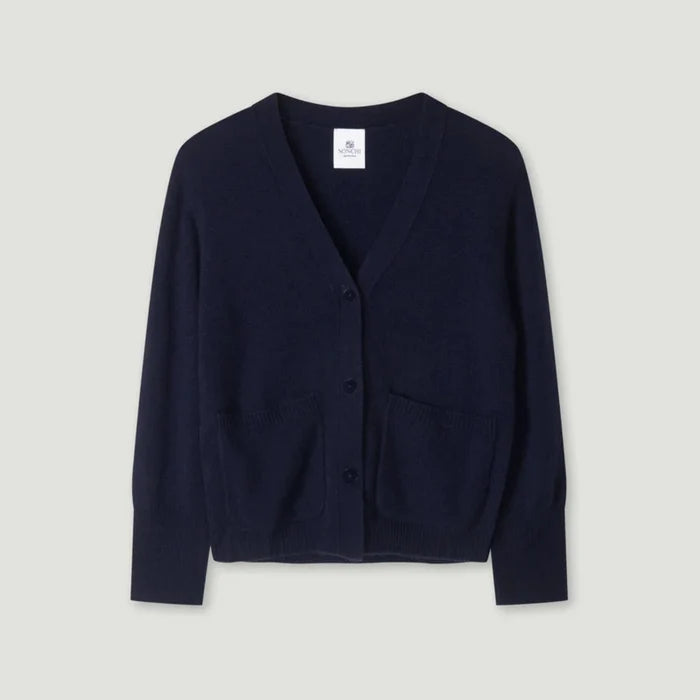 Navy blue cardigan on a light gray background | Lead