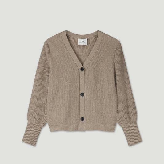 Beige cardigan with buttons on a light gray background | Lead