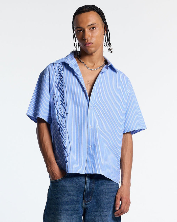 OFFICE SCRIPT SHIRT BLUE - blue striped short sleeve shirt, front view on male model - Cold Culture