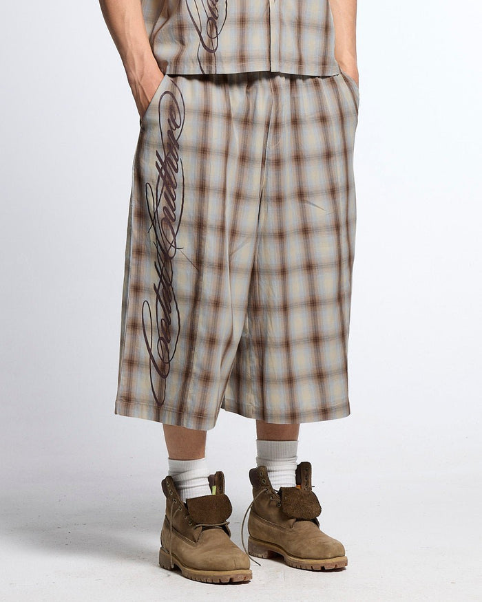 OFFICE SCRIPT SHORTS BEIGE - beige plaid wide leg shorts, front view on male model - Cold Culture
