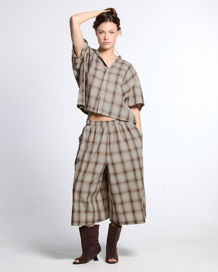 OFFICE SCRIPT SHORTS BEIGE - beige plaid wide leg shorts, front view on female model - Cold Culture #woman