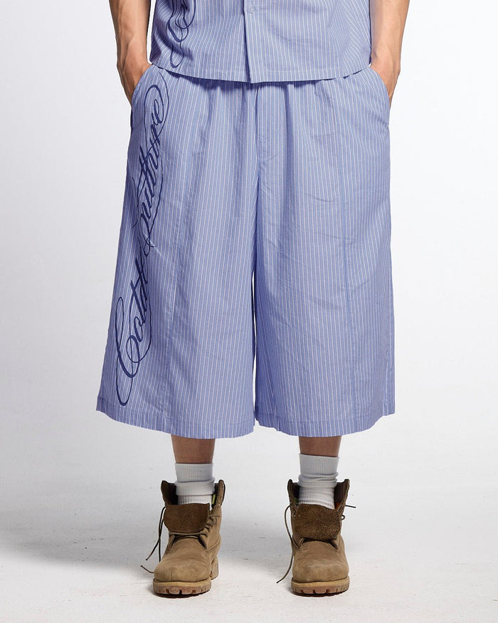 OFFICE SCRIPT SHORTS BLUE - blue striped wide leg shorts, front view on male model - Cold Culture