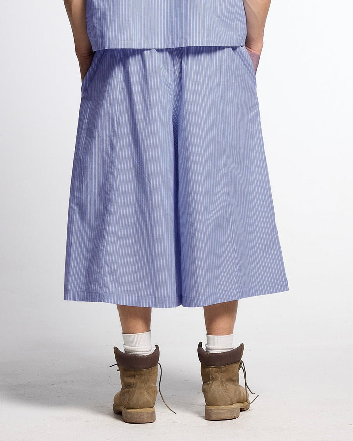 OFFICE SCRIPT SHORTS BLUE - blue striped wide leg shorts, back view on male model - Cold Culture