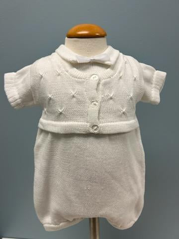 White knit baby boy romper with vest and bowtie.